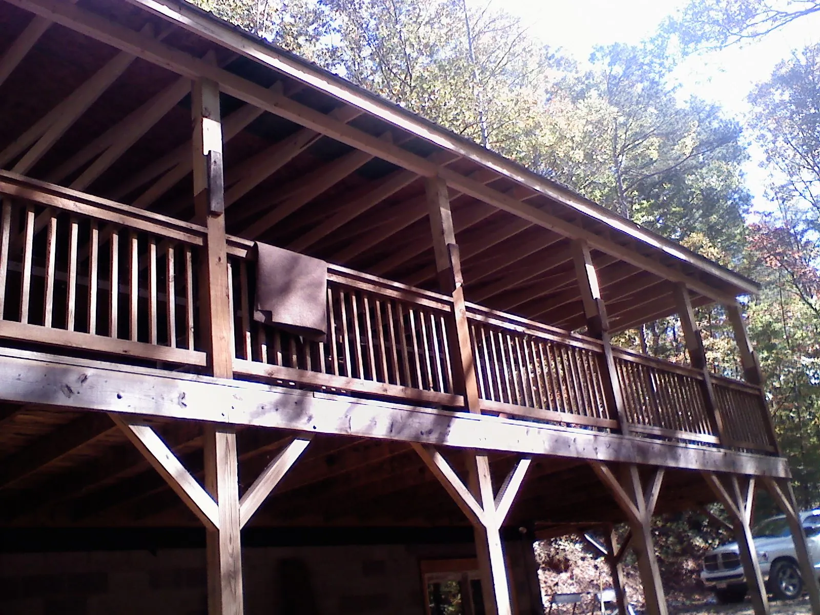 Timber framing under a new elevated porch and deck — Roof Leak Repair in East Northport by Roofing Brothers